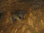 27.09.2014 Grotte de la Malatier / Frankreich
Schlufstelle
In einigen Schlufen kann man auf allen vieren krabbeln. 
Wird der Schluf niedriger, muss gerobbt werden.